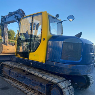 La pelle WACKER NEUSON 14504RD en arrière